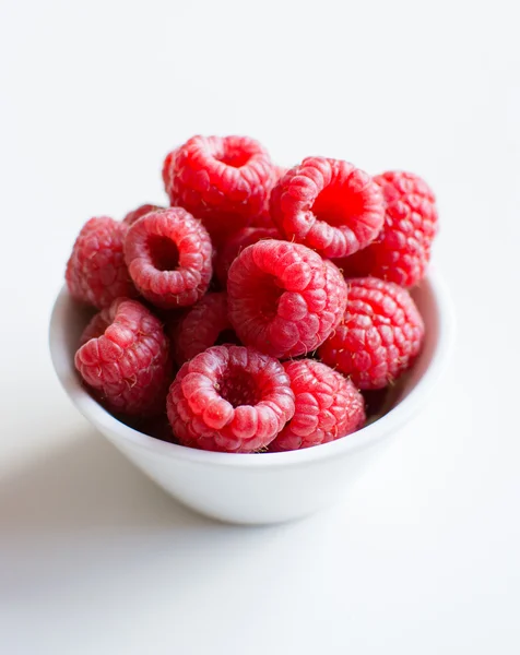 Raspberries in bowl — Stock Photo, Image