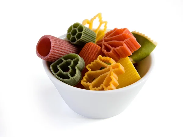 Multicolored italian pasta in bowl — Zdjęcie stockowe
