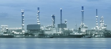 Landscape of river and oil refinery factory clipart