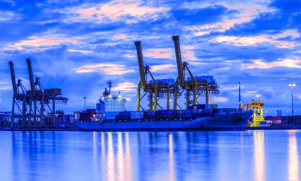 Container Cargo freight ship with working crane bridge in shipya — Stock Photo, Image