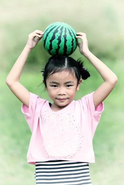 Criança bonita com melancia — Fotografia de Stock