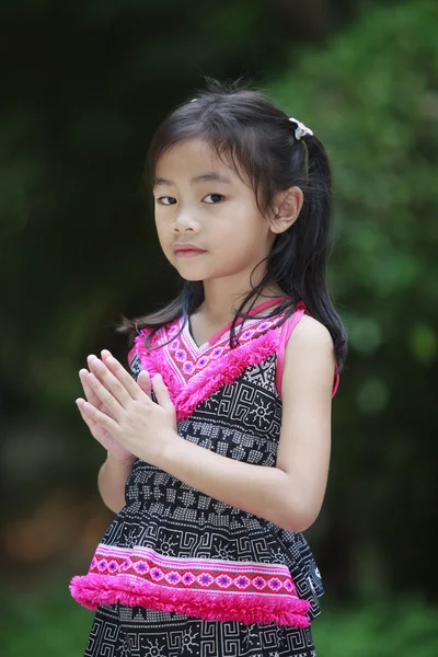 Thai kid with typical welcome expression sawasdee — Stock Photo, Image