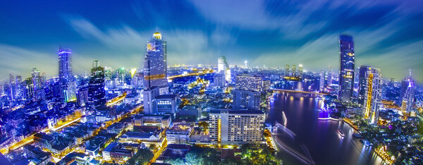 Bangkok city at twilight whit express way and cho pra-ya river, Thailand.