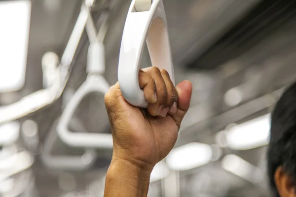 Holding onto a handle — Stock Photo, Image