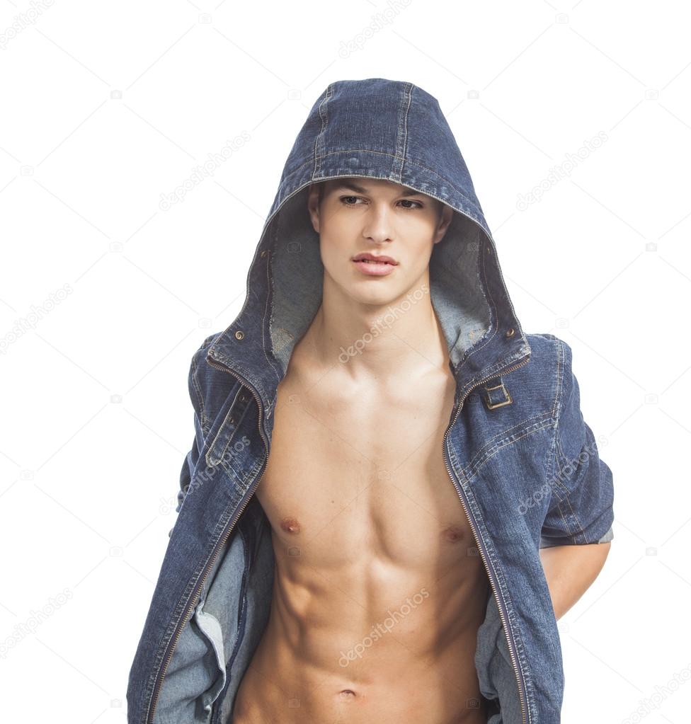 Muscle sexy young man and handsome posing in jeans