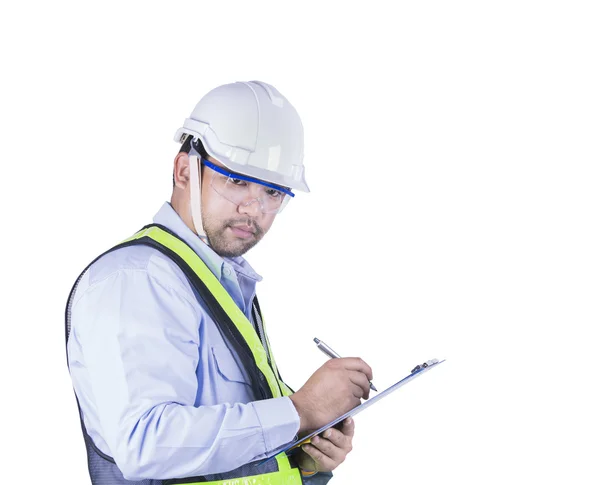 Ingeniero asiático escribiendo en portapapeles — Foto de Stock