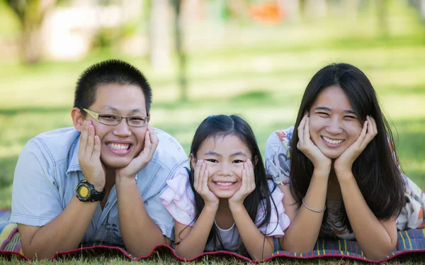 Happy asian mother, father and daughter — Stock Photo, Image