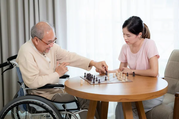 Asian Granddaughter Grandfather Take Care Play Chess Togather Living Room — Stock Photo, Image