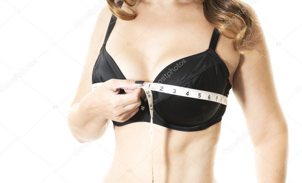 woman measuring bra size