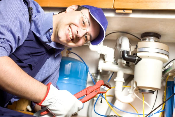 Plumber at work Royalty Free Stock Images