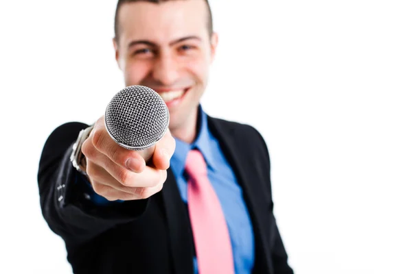 Man holding a microphone — Stock Photo, Image