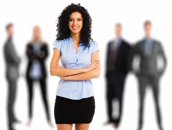 Businesswoman in front of her team — Stock Photo, Image