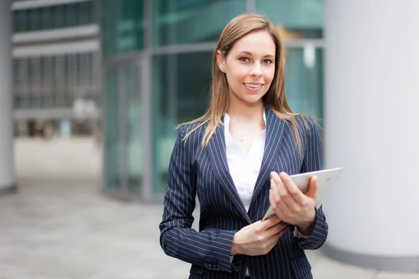 Woman holding a digital tablet — Stock Photo, Image