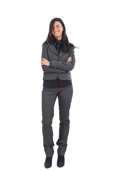 Full length image of confident business woman with hands folded over white background — Stock Photo, Image