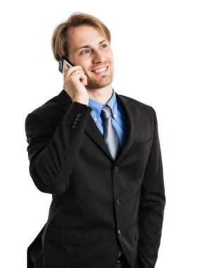 İş adamı telefonda konuşuyor.