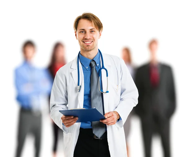 Handsome doctor in front of his patients — Stock Photo, Image