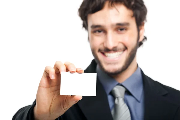 Smiling businessman showing a blank card — Stock Photo, Image