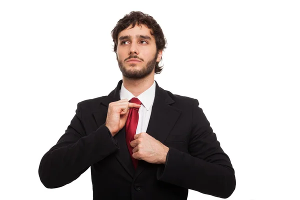 Empresário ajustando sua gravata — Fotografia de Stock