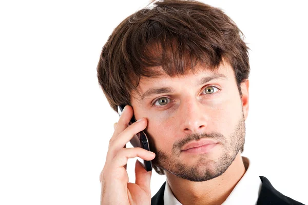 Empresário a falar ao telefone. Isolado em branco . — Fotografia de Stock