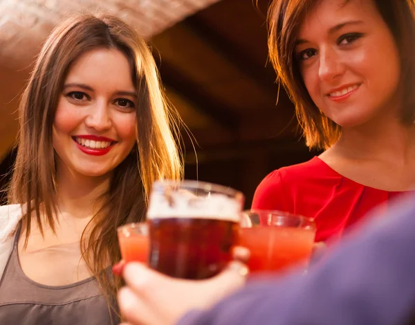 Friends having a round of drinks — Stock Photo, Image