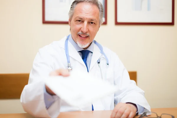 Doctor giving a prescription — Stock Photo, Image