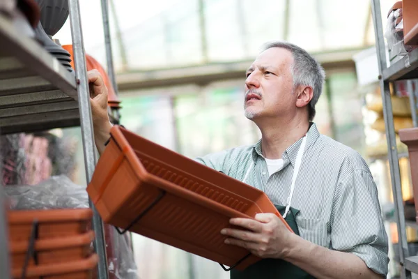 Florist carrying boxes — Stock Photo, Image