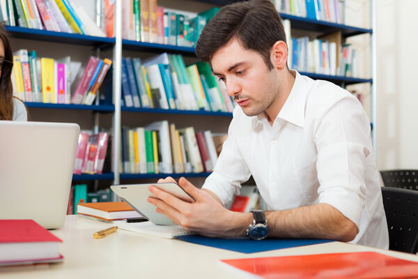 Student using his tablet