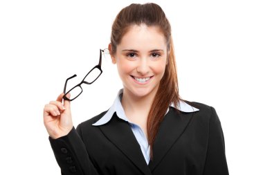 onun gözlük tutan güzel gülümseyen iş kadını portresi