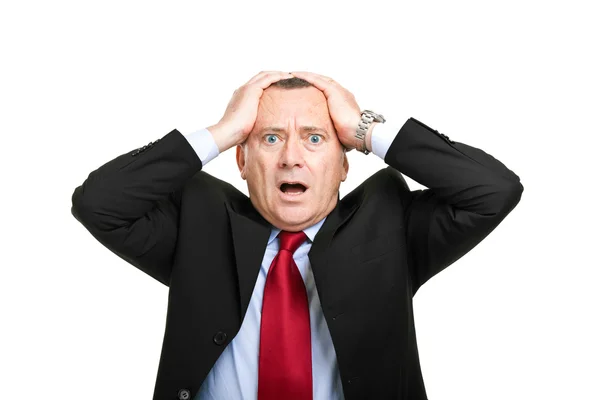 Despaired and shocked mature businessman — Stock Photo, Image