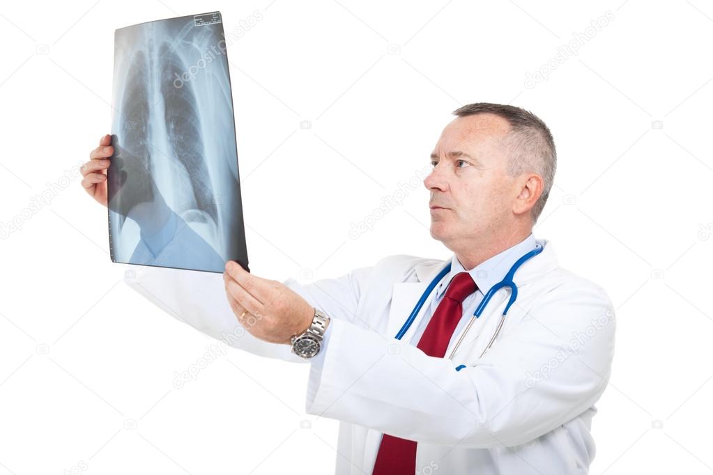 Senior doctor examining a lung radiography
