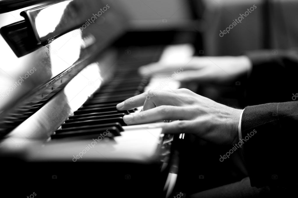 Man playing piano — Stock Photo © minervastock #30138151