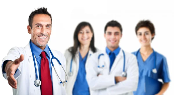Doctor in front of his medical team — Stock Photo, Image