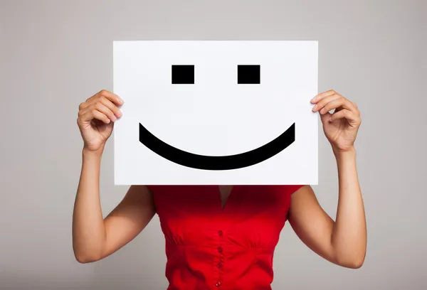 Smiling emoticon Stock Picture
