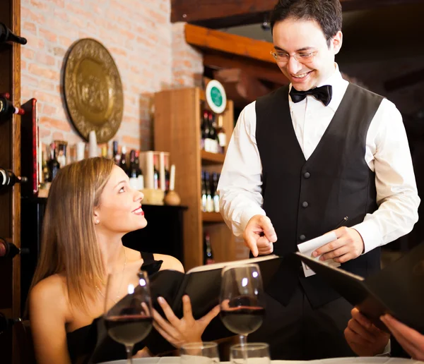 Waiter suggesting food — Stock Photo, Image