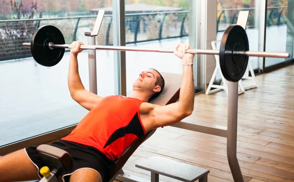 Man lifting a yoke Royalty Free Stock Images