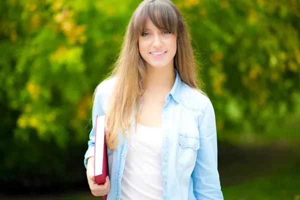 Portrait of a beautiful smiling student — Stock Photo, Image