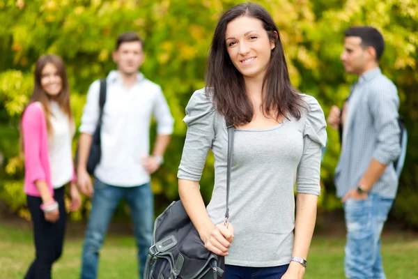 Outdoor portrait of a smiling students — Stock Photo, Image