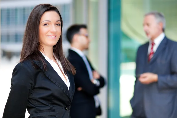 Business partners talking in an urban setting — Stock Photo, Image