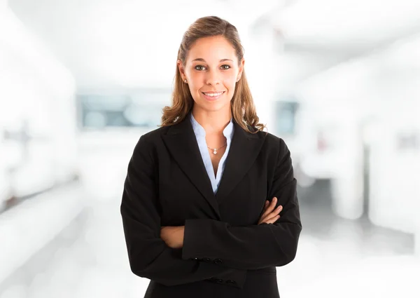 Businesswoman with hands folded — Stock Photo, Image