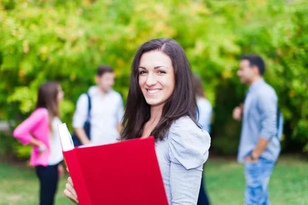 Outdoor portrait of a smiling student — Stock Photo, Image