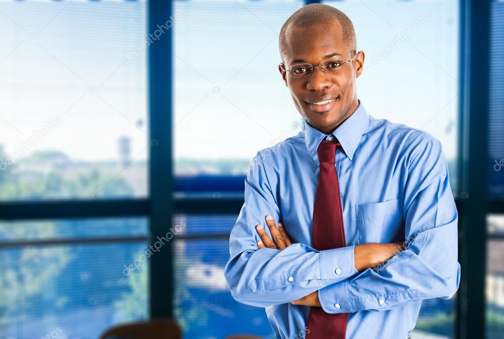 Businessman with hands folded