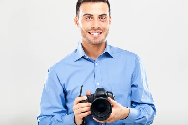 Fotógrafo usando su cámara — Foto de Stock