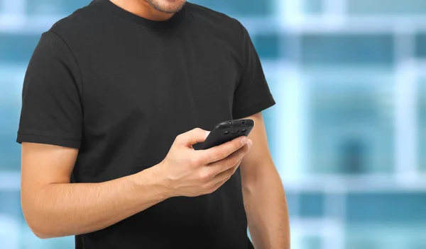 Man using his smartphone — Stock Photo, Image