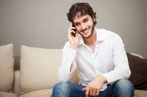 Young man talking on the phone — Stock Photo, Image