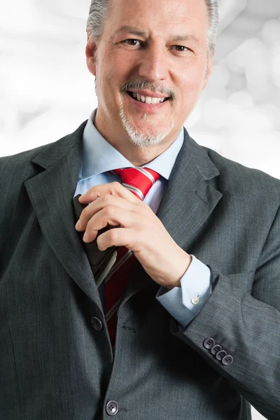 Mature man paying a bill — Stock Photo, Image