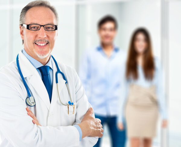Doctor in front of a couple