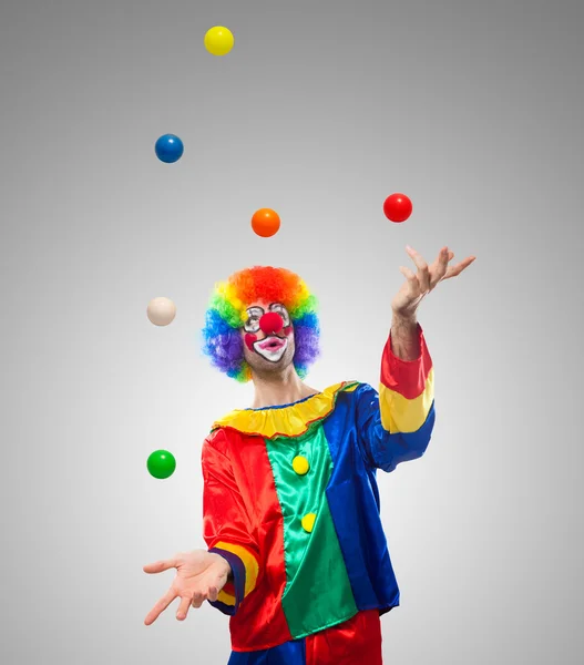 Clown juggling balls — Stock Photo, Image