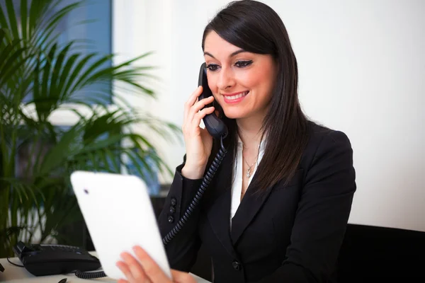 Woman using a tablet — Stock Photo, Image