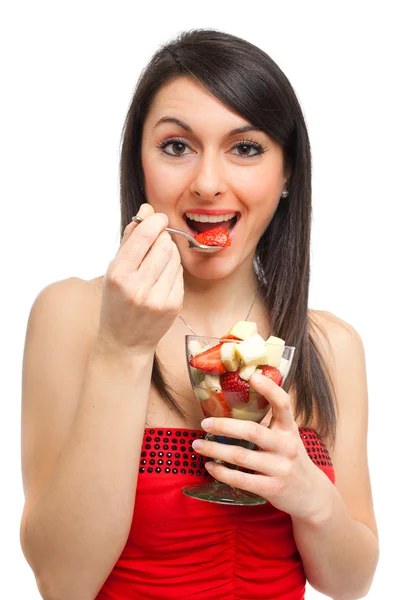 Woman eating fruit cocktail — Stock Photo, Image