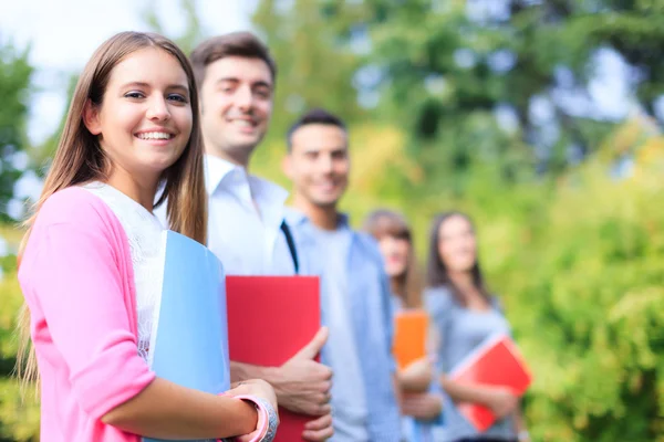 Students in a park Royalty Free Stock Images